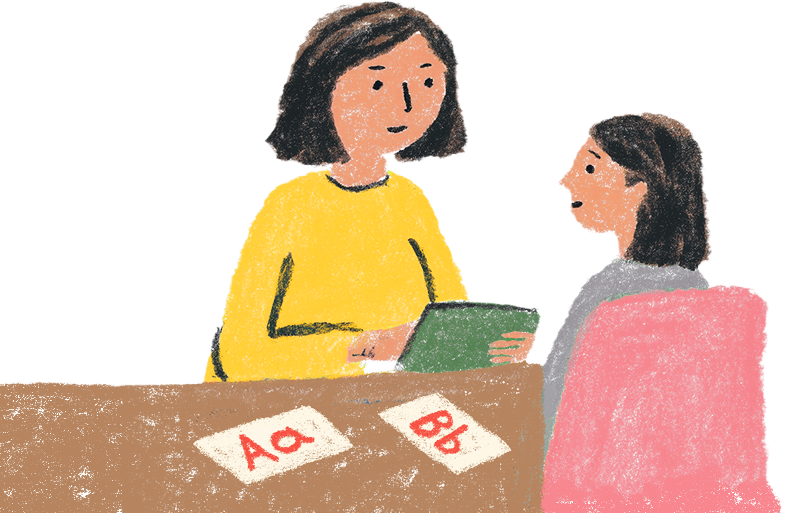 A caregiver and child playing with a guide